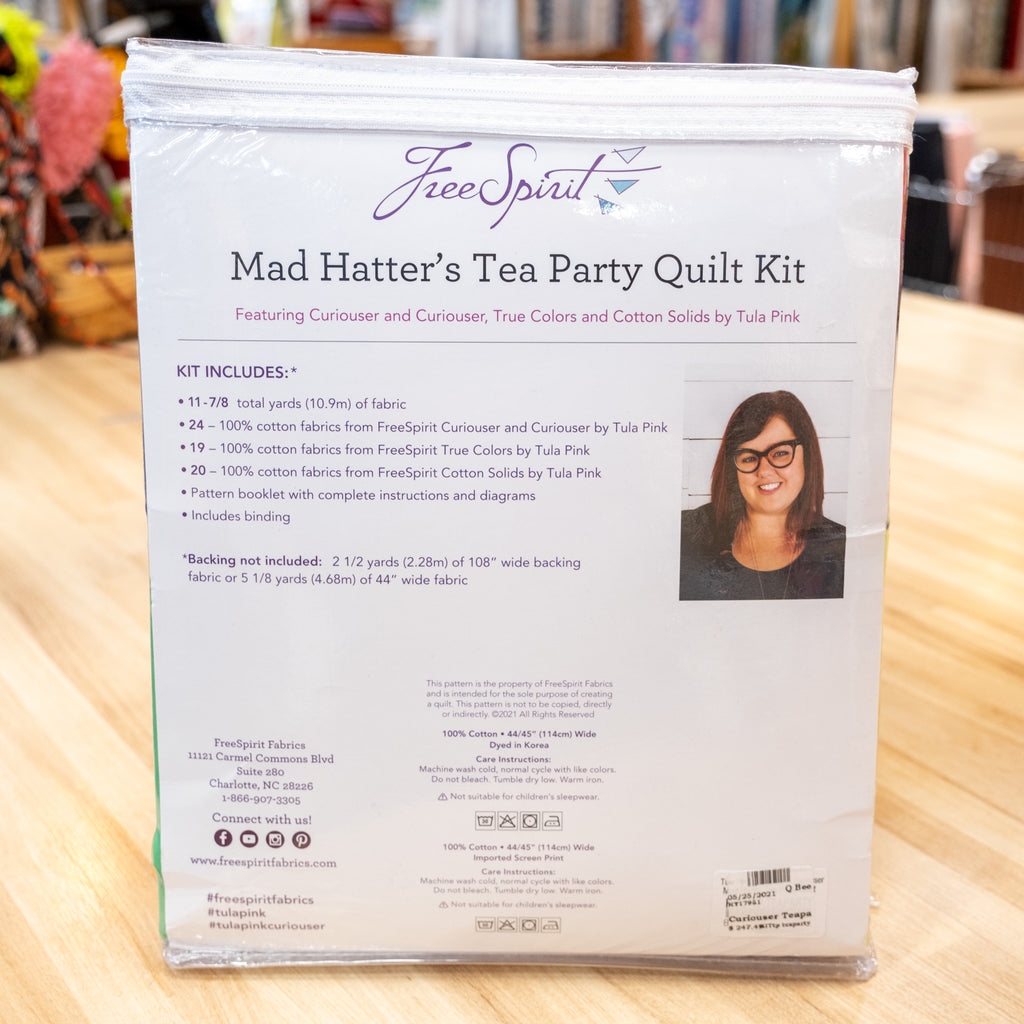 https://quilting-bee-spokane.myshopify.com/cdn/shop/products/MadHatterteapartyQuiltKit-2_1024x1024.jpg?v=1674593674